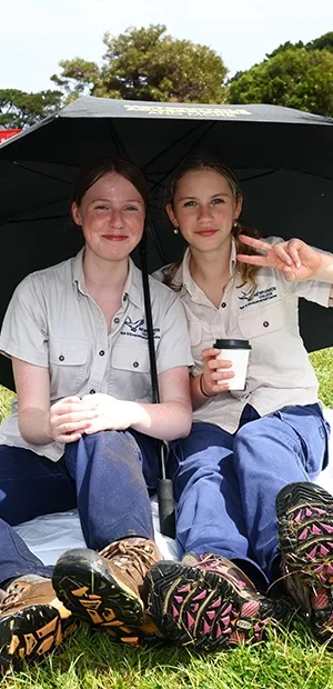 Two fans watching the action